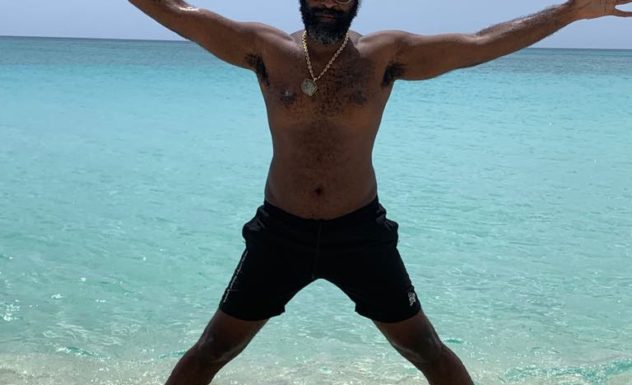 Reggae Artist Stuart Wilson on the Beach in the Cayman Islands